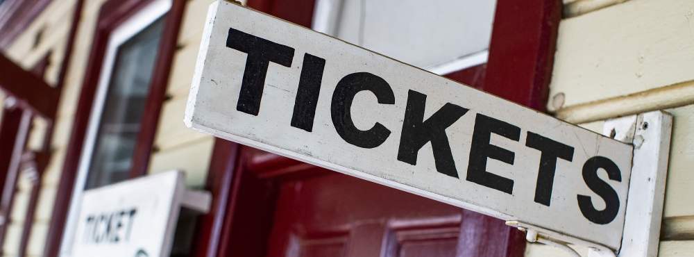 Village Junction Station tickets sign