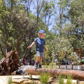 Playgrounds - Pia's Place - boy on balance beam