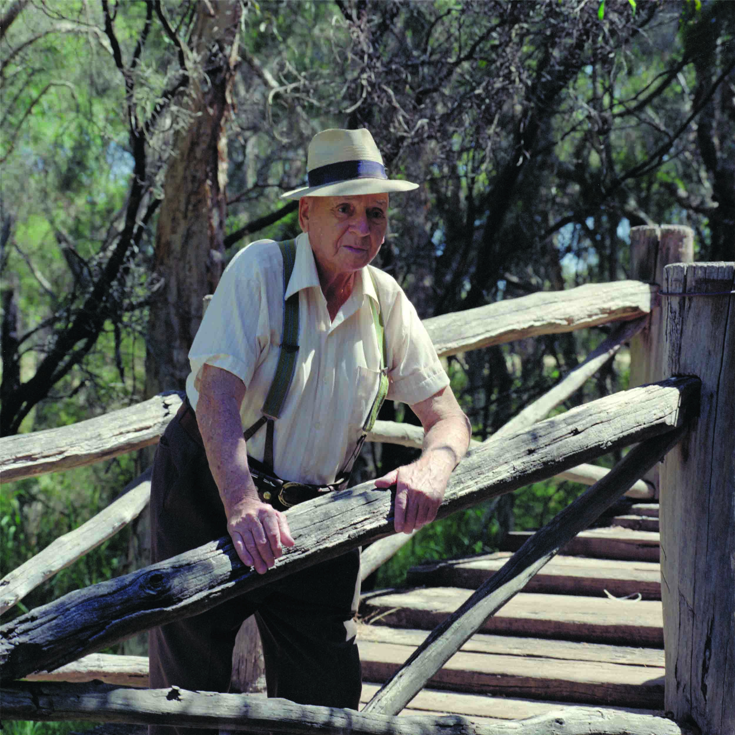 Lew Whiteman at log bridge