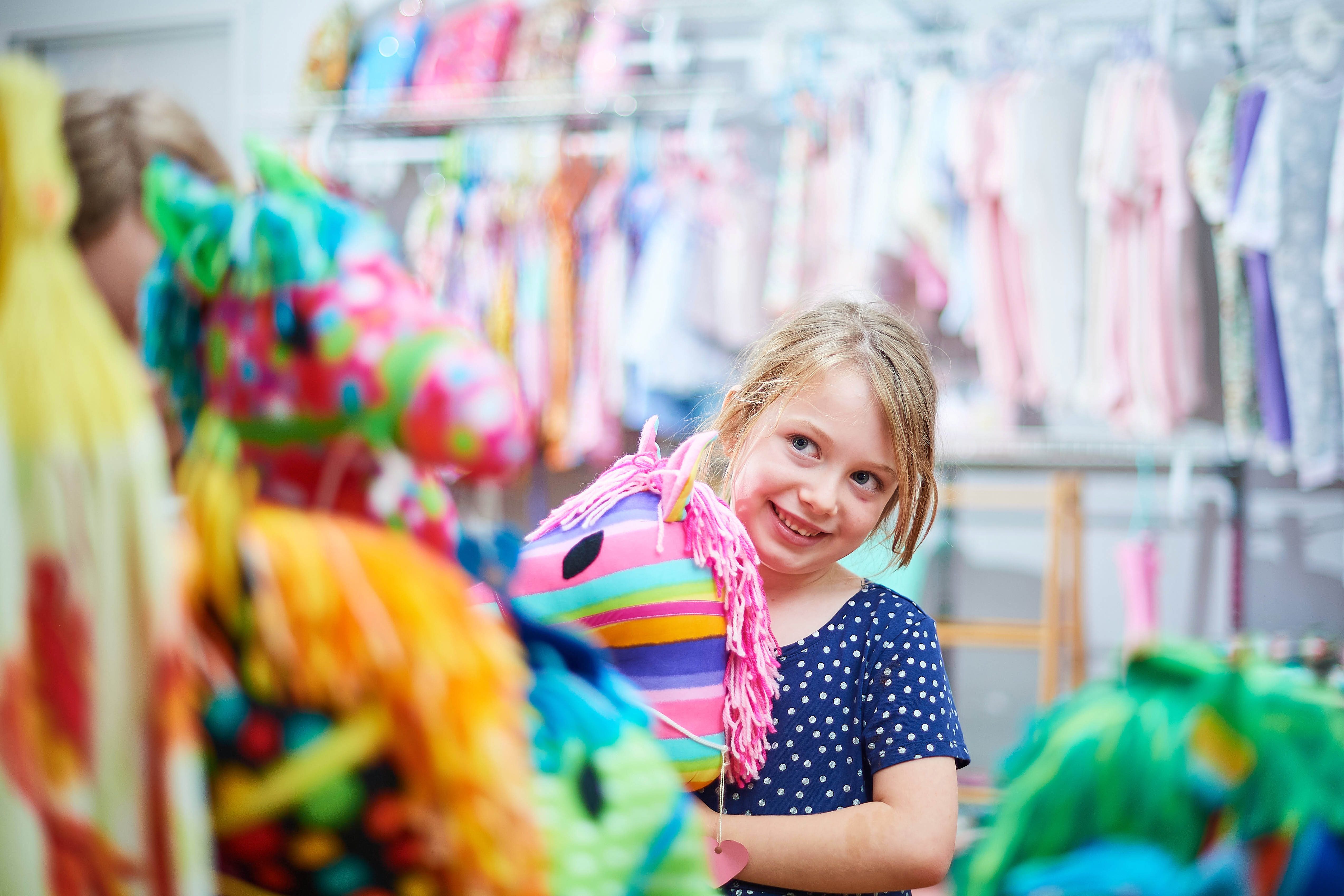 209 Whiteman Park Handcraft Centre child with pony WEB BANNER